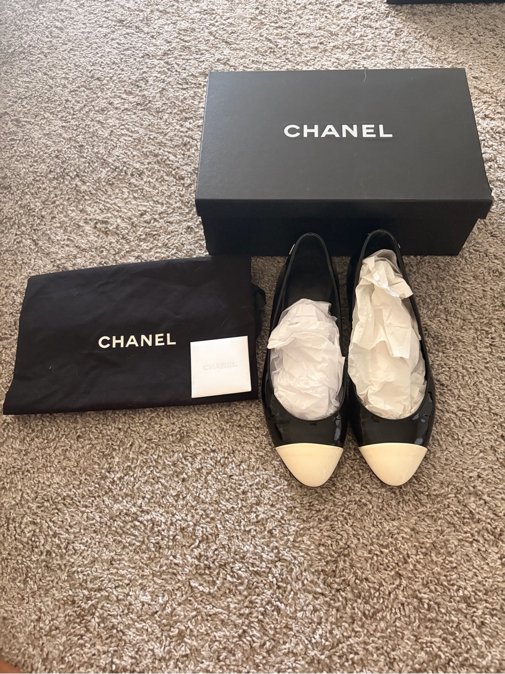 CHANEL Black Patent Leather Ballet Flats with Cream Cap Toe
